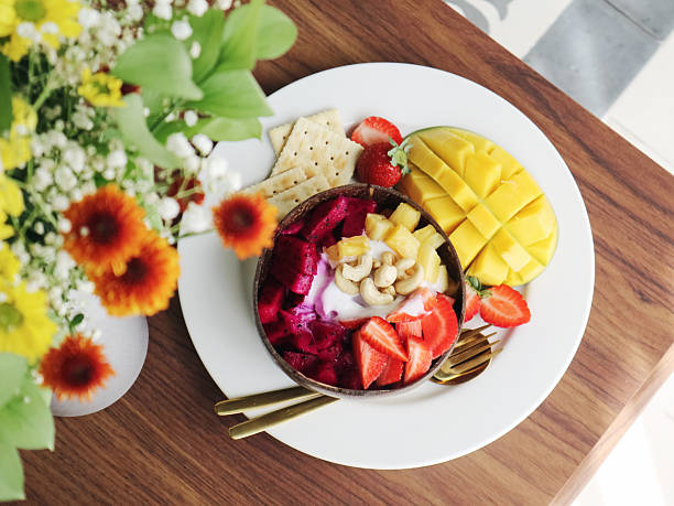 istock Smoothie bowl with mango, strawberry, dragon fruit 2234537918
