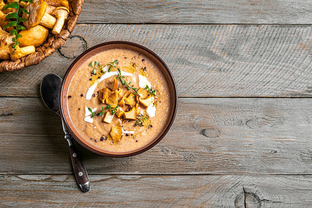 istock Cream soup with chanterelle mushrooms 2234537931