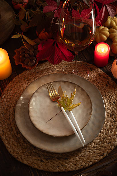 istock Autumn Table Setting with Plates, Wine, Pumpkins and Seasonal Decor 2234540788