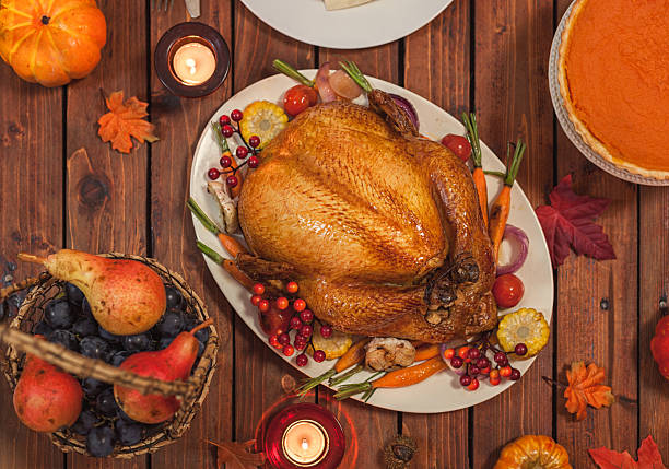 Traditional stuffed turkey with side dishes for Thanksgiving celebration