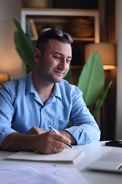 istock Businessman working at his home office 2234547537