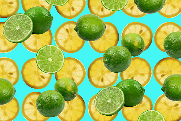 istock Philippine Lime Fruit Cuts Pattern, Green Calamondin Slices Flying Minimal Background 2234549333
