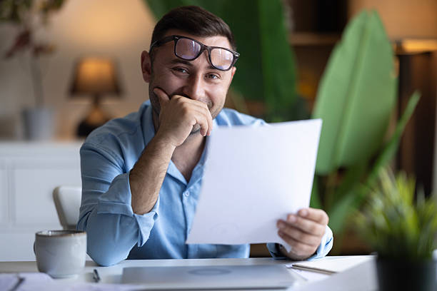 istock Freelancer enjoying the flexibility of remote work in his home office 2234549895