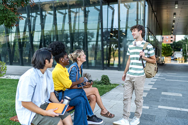 istock University students meeting outside campus building 2234549976