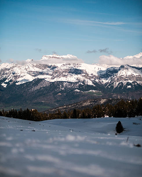 Ski slope and snowcapped mountains, Semnoz