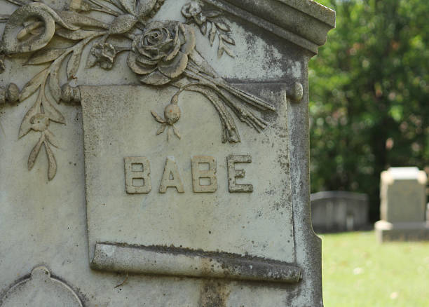 istock Headstone in Historic Cemetery With Word Babe Engraved 2234552918