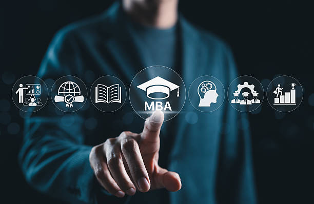 istock MBA Program Concept. Master of Business Administration. Businessman pointing MBA text and graduation cap icon, educational and professional development symbols representing business learning. 2234553597