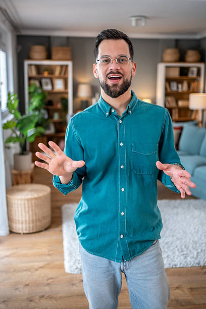 istock Young man making a video call from home office 2234556882