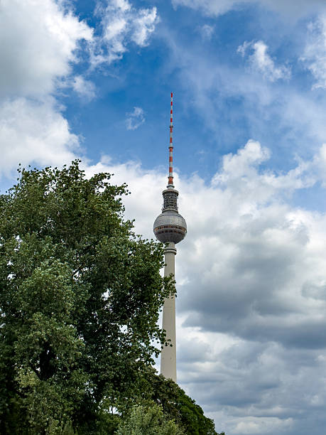 istock Alexanderplatz TV tower on the beautiful blue sky background with  clouds. 2234559760