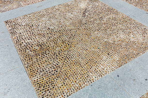 Traditional patterned pebble stone pavement texture in Cadiz, Andalusia, Spain, September 2025. High quality photo