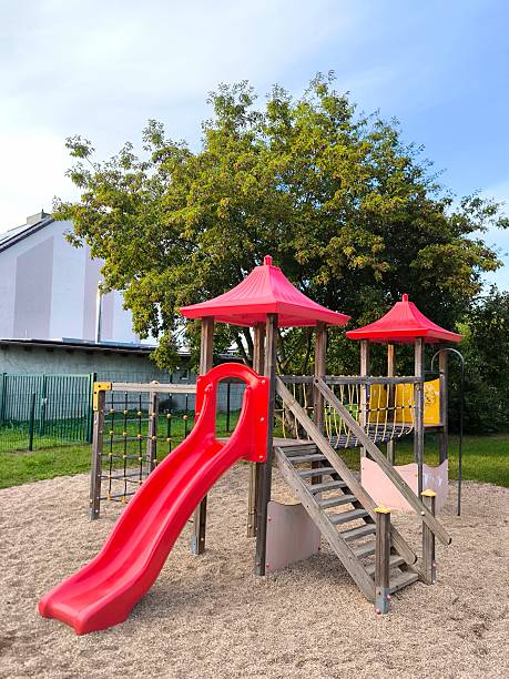 istock Children's playground in the park at sunset 2234559985