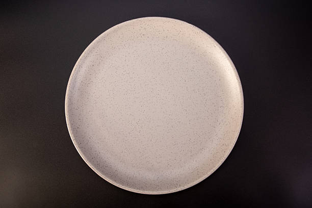 istock Beautiful plate, beautiful plate alone placed on a dark background, selective focus. 2234561429