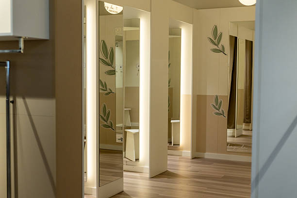 istock Modern restroom interior with stylish mirrors and elegant decor in a public space 2234561511