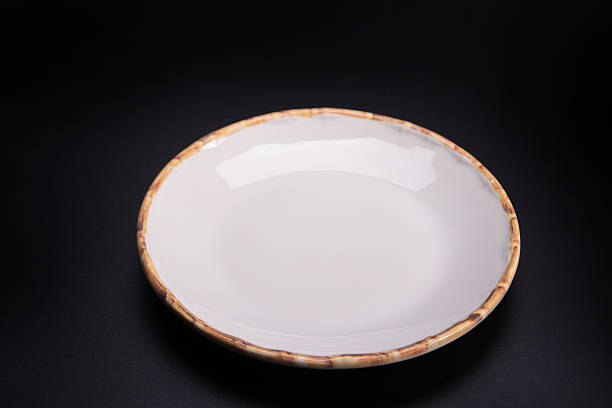 istock Beautiful plate, beautiful plate alone placed on a dark background, selective focus. 2234562017