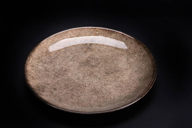istock Beautiful plate, beautiful plate alone placed on a dark background, selective focus. 2234562068