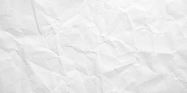 istock White folded and wrinkled paper texture background 2234570993