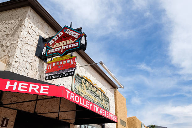Sedona, Arizona USA - April 24, 2017: Main Street cityscape with tourist tours in this popular small town with beautiful sandstone formations