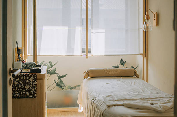 istock Tranquil spa room with massage bed and soft natural daylight 2234575690