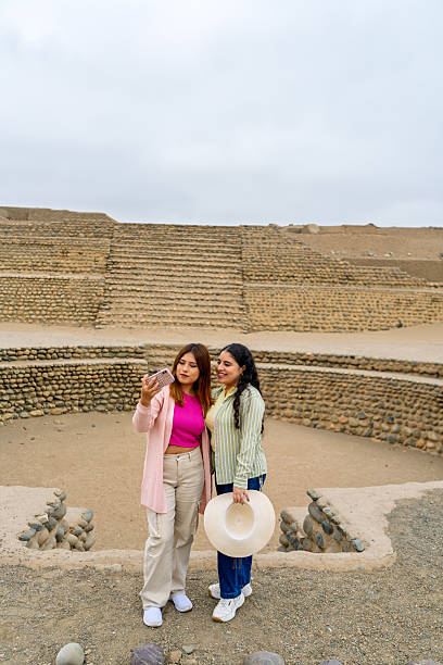 istock Tourists taking selfie at caral, peru, pre-inca ruins 2234584817