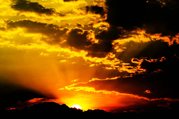 A fiery sky painted with golden hues and dramatic clouds in Sydney, NSW, Australia. (Photo by Tara Chand Malhotra)
