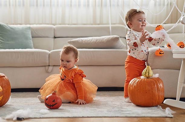 istock Twin sisters on Halloween day 2234598610