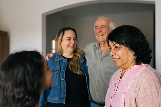 istock Multi-generational family smiling together indoors 2234600228