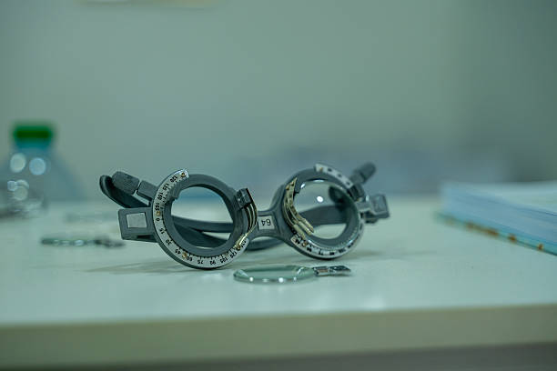 Close up of an old fashioned phoropter - an ophthalmic testing device commonly used by eye care professionals during an eye examination - at the optometrist.