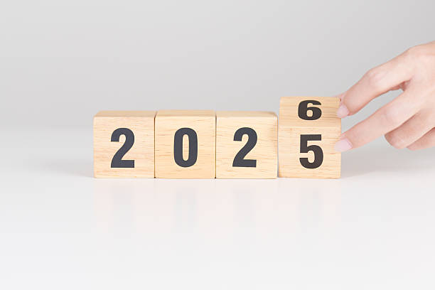 istock 2025 change to 2026 year block on table. goal, Resolution, strategy, plan, start, budget, mission, action, motivation and New Year concepts 2234603343
