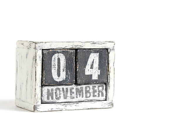 November 04 on wooden calendar, on white background