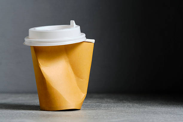 istock Crumpled paper cup for hot coffee and tea drinks. 2234605858