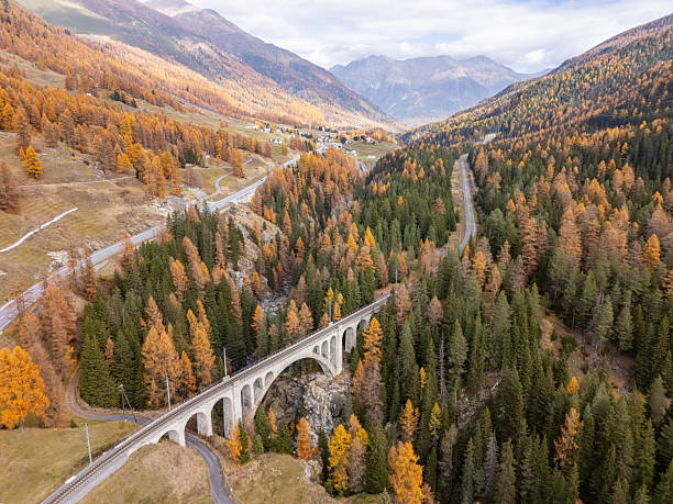 istock Mountain Road and Railway Bridge in Autumn 2234611526