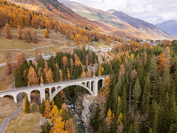 istock Mountain Road and Railway Bridge in Autumn 2234611527