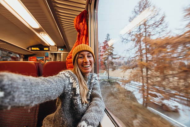 istock Young Woman Taking Selfie on Scenic Train Ride 2234611795