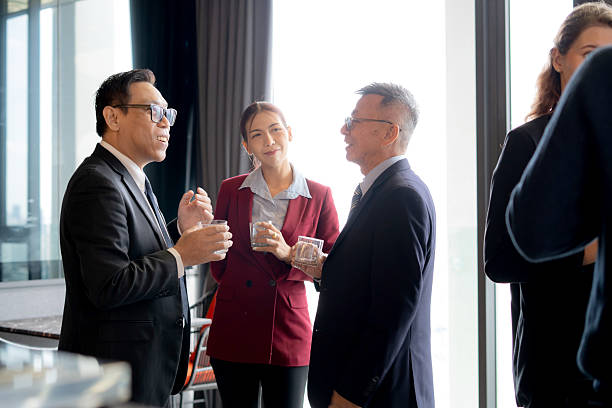 istock Group asian business people discussion at conference in office after break, collaboration teamwork and networking for marketing, colleague team and seminar for success, business strategy and planning. 2234615852