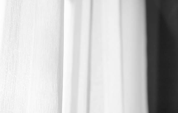 istock Sunlight on curtain, blurred shadow tulle background, sheer curtains, silk veil fabric 2234617728
