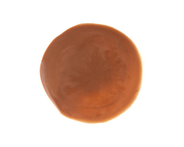 istock Spilled chocolate milk isolated, hot chocolate puddle, liquid stain, coffee splatter, brown latte 2234617811