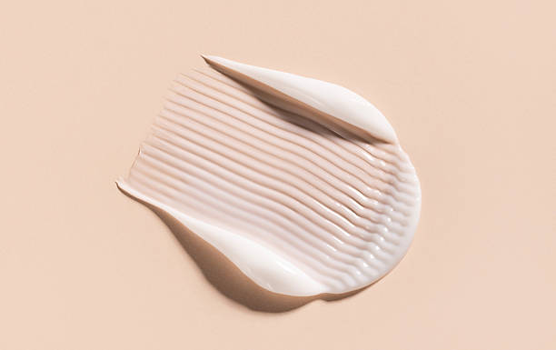 istock sample smear of creamy white texture on light beige background close up 2234618666