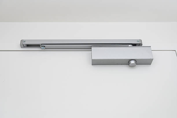 istock Modern Silver Door Closer Installed on an Interior Door 2234619260