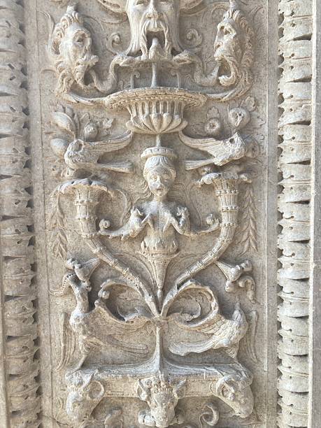 istock Decorative Relief With Birds Urns and Fish 2234619554