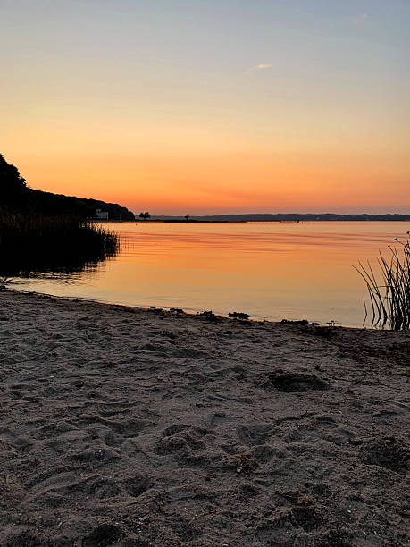 istock Beautiful red pink sunset at the beach in summer 2234622608