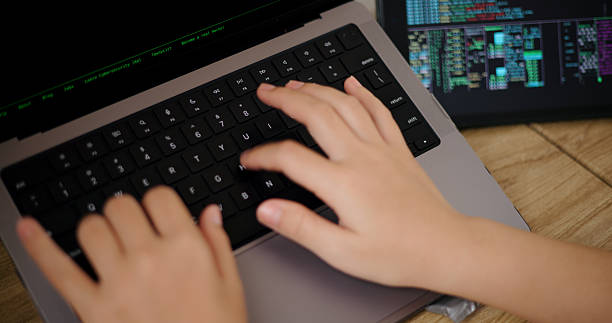 istock A young woman's hands are typing on a laptop. 2234623856