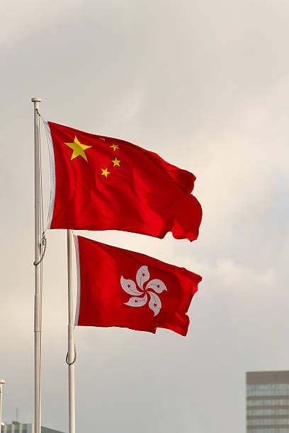 istock Hong Kong And Chinese Flags 2234627631