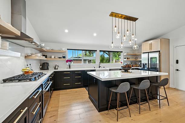 istock Bright modern kitchen with center island, pendant lighting, and open concept design in a luxury home 2234628613