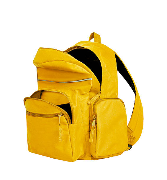 istock Yellow backpack opened isolated on white.School bag advertisement design. Knapsack, rucksack,travel bag.Touristic items. 2234629336