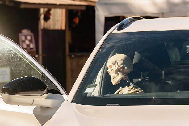 istock The idea of being bored to death while waiting in a car A Visual Metaphor 2234629884