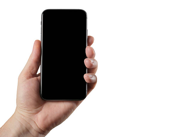 istock Man holds modern smartphone with black screen in hand. 2234634874