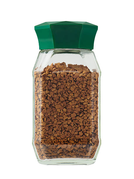istock Glass jar with plastic lid green color with instant coffee drink. 2234635012
