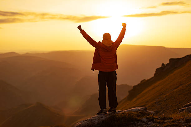 istock Mid adult man at sunset looking at view 2234638163