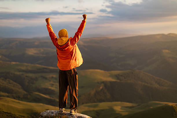 istock Mid adult man at sunset looking at view 2234638185