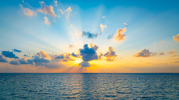 istock Sunset on the beach as horizon over the ocean landscape for background 2234641372
